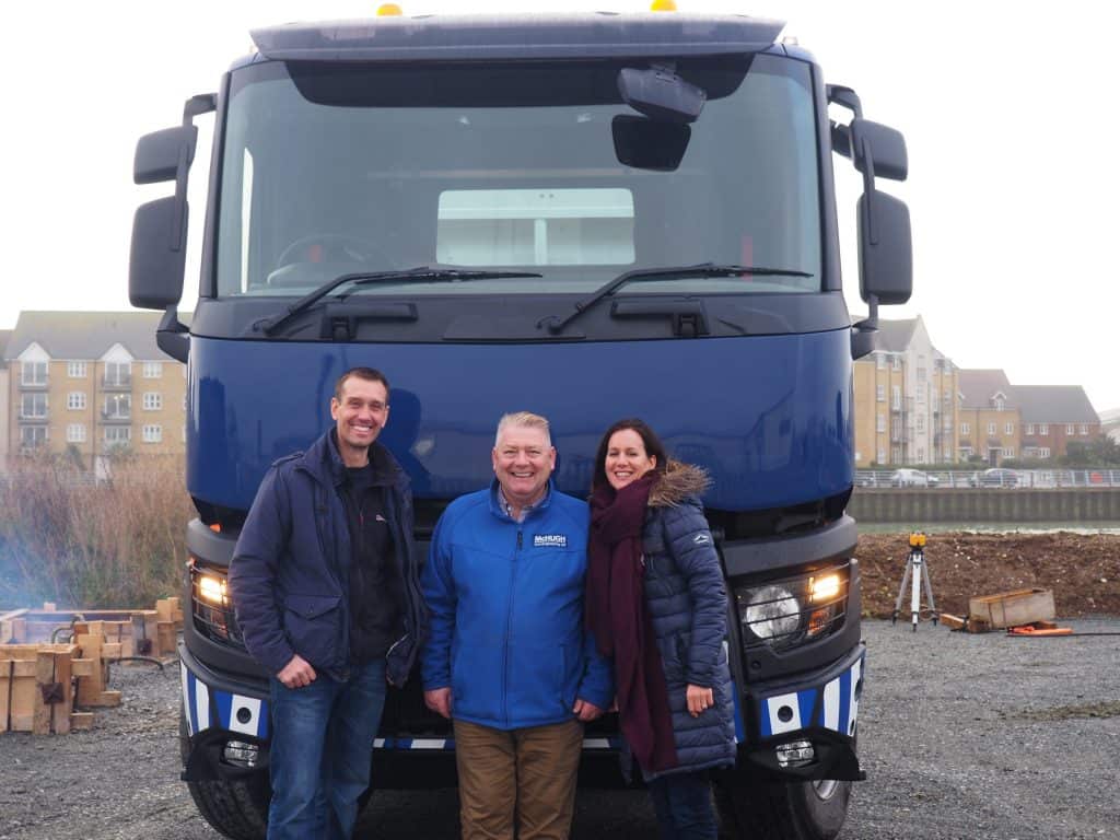 Rob Sean and Claire in front of a McHugh Lorry